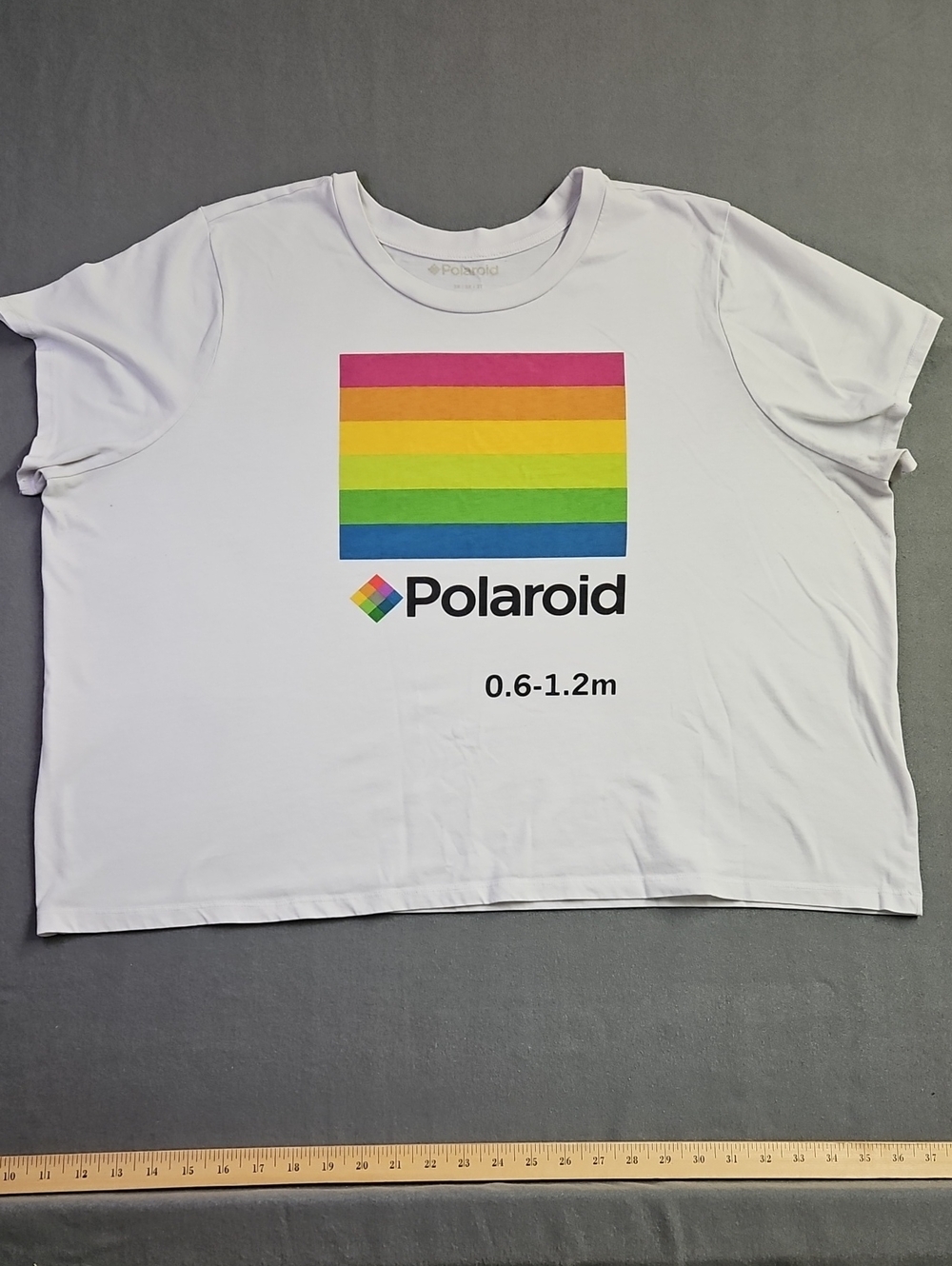 Polaroid White Tee with Bright Rainbow Block Graphic